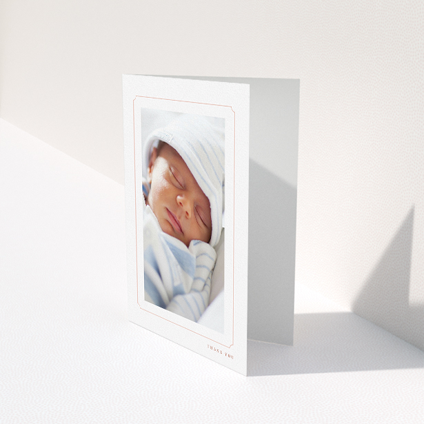 A new baby thank you card design titled "Thin Pink". It is an A5 card in a portrait orientation. It is a photographic new baby thank you card with room for 1 photo. "Thin Pink" is available as a folded card, with tones of white and pink.