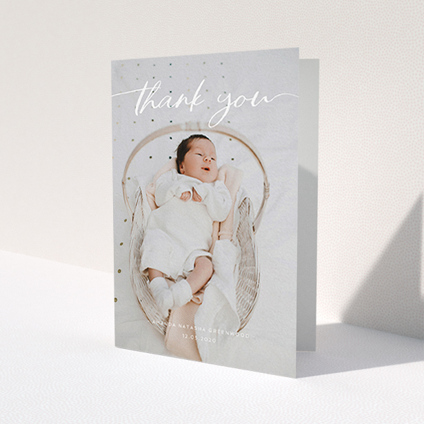 A new baby thank you card template titled 'Topped and Bottomed'. It is an A6 card in a portrait orientation. It is a photographic new baby thank you card with room for 1 photo. 'Topped and Bottomed' is available as a folded card, with mainly white colouring.