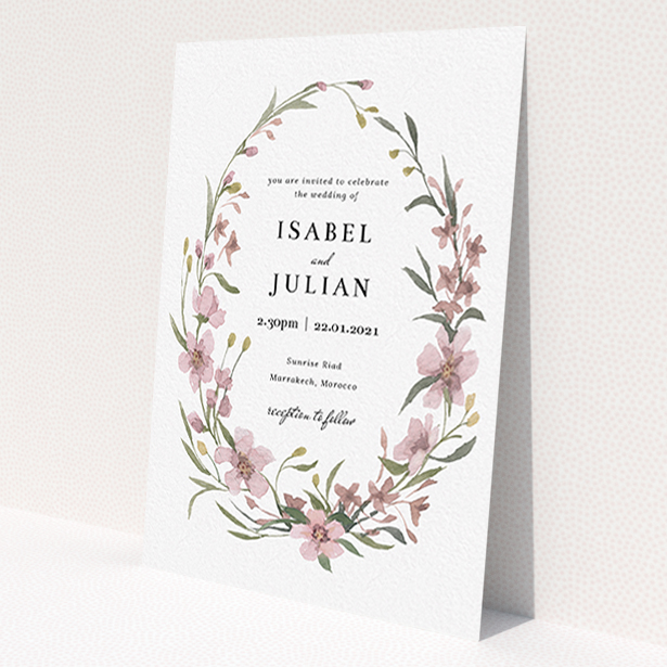 A personalised wedding invitation called 'Autumn Floral Wreath'. It is an A6 invite in a portrait orientation. 'Autumn Floral Wreath' is available as a flat invite, with tones of faded pink and autumnal green.