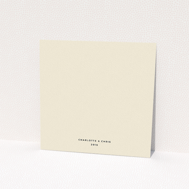A personalised wedding invitation named "Nice and square". It is a square (148mm x 148mm) invite in a square orientation. "Nice and square" is available as a flat invite, with mainly dark cream colouring.