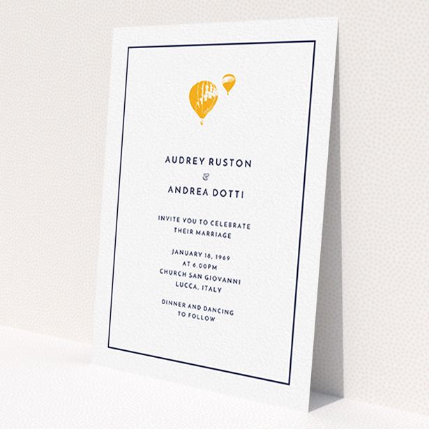 A personalised wedding invitation design named 'Off and away'. It is an A6 invite in a portrait orientation. 'Off and away' is available as a flat invite, with tones of white and orange.