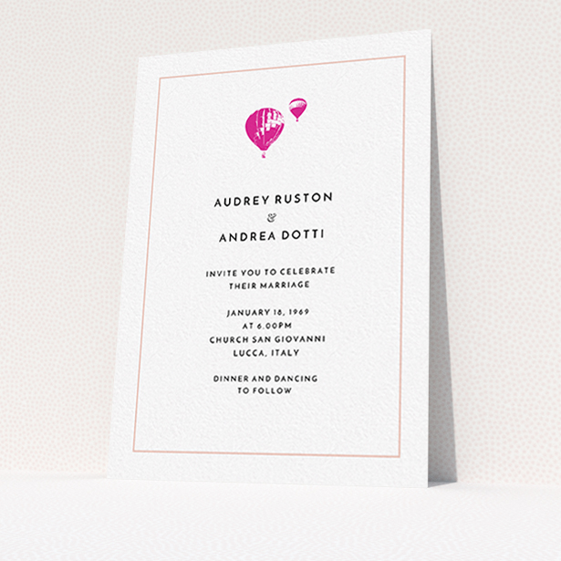 A personalised wedding invitation design titled "Off and away". It is an A6 invite in a portrait orientation. "Off and away" is available as a flat invite, with tones of white and pink.
