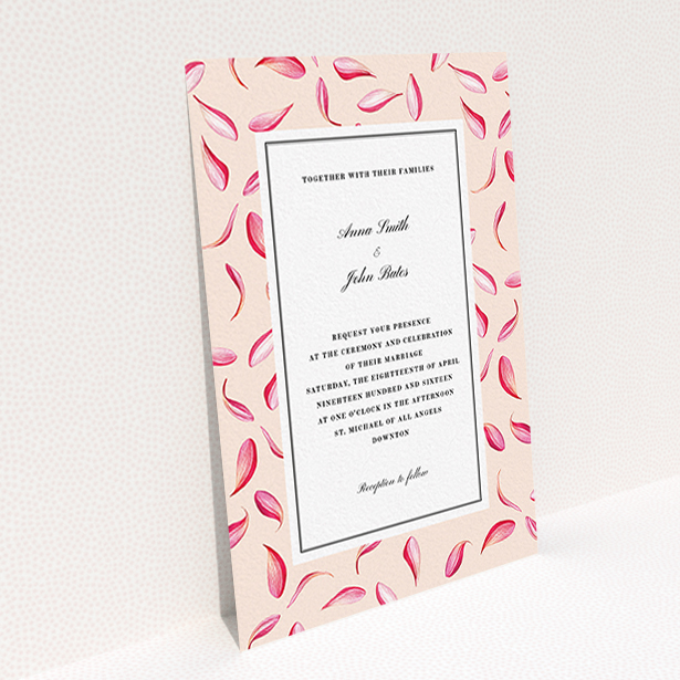 A personalised wedding invitation template titled "Petal avalanche". It is an A6 invite in a portrait orientation. "Petal avalanche" is available as a flat invite, with tones of pink, red and white.