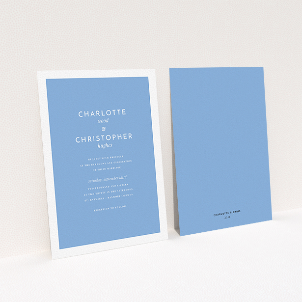 A personalised wedding invitation called "Script switch". It is an A6 invite in a portrait orientation. "Script switch" is available as a flat invite, with tones of blue and white.