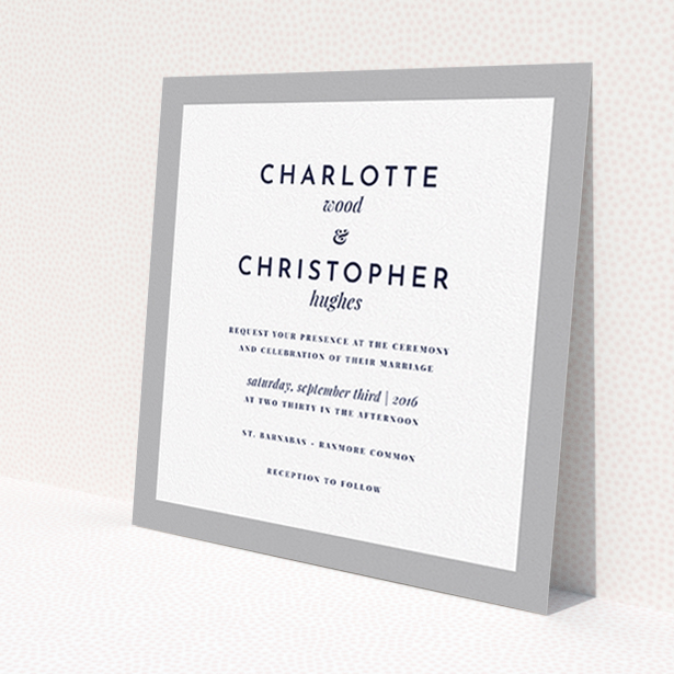 A personalised wedding invitation design named 'Script switch'. It is a square (148mm x 148mm) invite in a square orientation. 'Script switch' is available as a flat invite, with tones of grey and white.