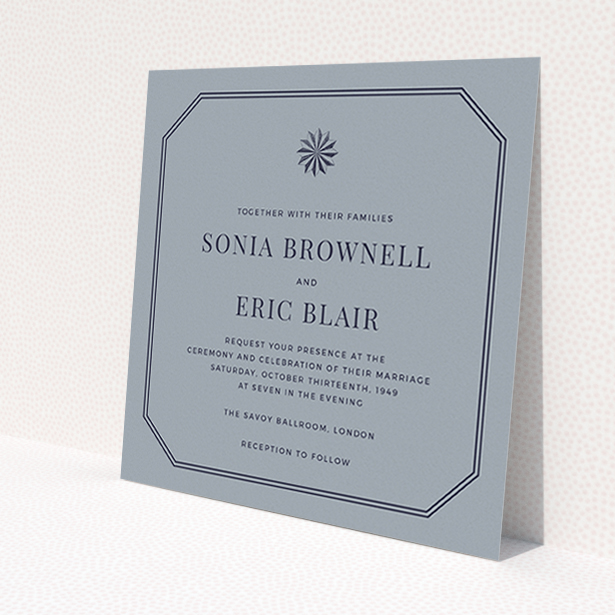 A personalised wedding invitation design called 'Shaded sundial'. It is a square (148mm x 148mm) invite in a square orientation. 'Shaded sundial' is available as a flat invite, with tones of dark grey and navy blue.