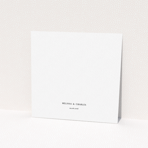 A personalised wedding invitation design called "Simply Love". It is a square (148mm x 148mm) invite in a square orientation. "Simply Love" is available as a flat invite, with tones of white and black.