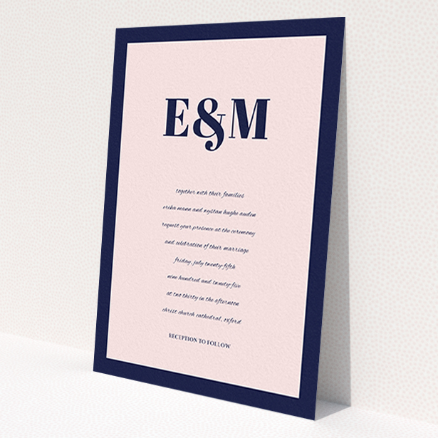 A personalised wedding invitation named 'Take on the sides'. It is an A6 invite in a portrait orientation. 'Take on the sides' is available as a flat invite, with tones of navy blue and pink.