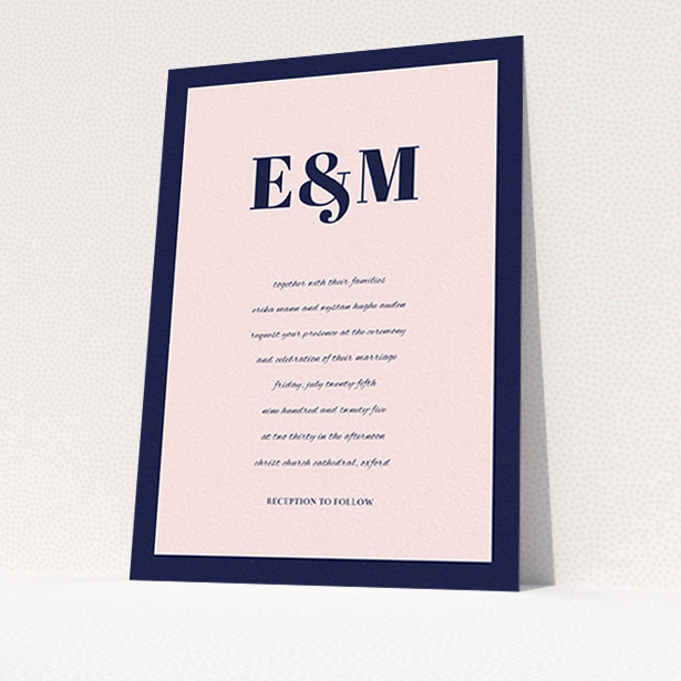 A personalised wedding invitation named "Take on the sides". It is an A6 invite in a portrait orientation. "Take on the sides" is available as a flat invite, with tones of navy blue and pink.