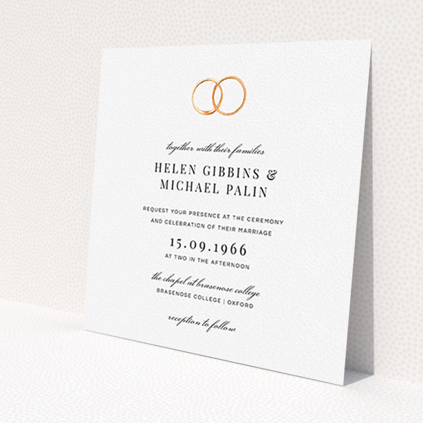 A personalised wedding invitation design named 'The newlyweds'. It is a square (148mm x 148mm) invite in a square orientation. 'The newlyweds' is available as a flat invite, with tones of white and gold.