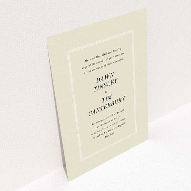 A personalised wedding invitation design called "Three line border". It is an A6 invite in a portrait orientation. "Three line border" is available as a flat invite, with mainly dark cream colouring.