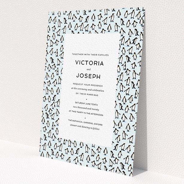 A personalised wedding invitation design titled 'Tiny, Tiny Penguins'. It is an A6 invite in a portrait orientation. 'Tiny, Tiny Penguins' is available as a flat invite, with tones of blue and white.