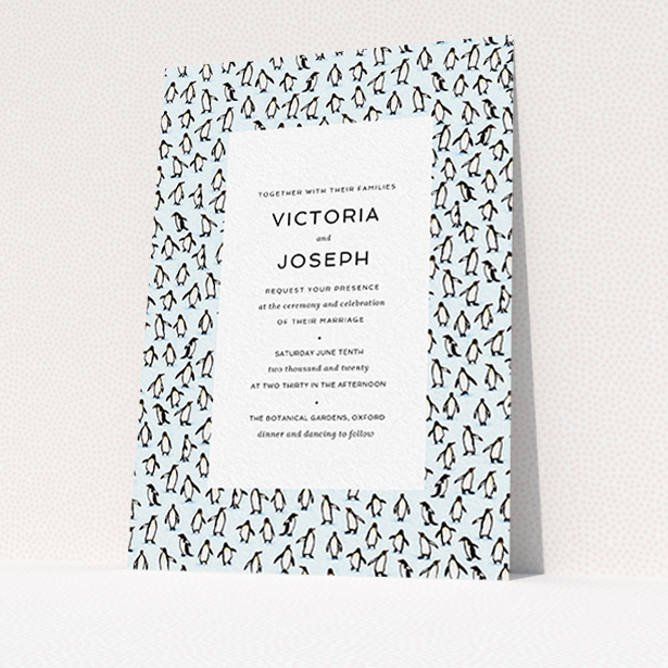 A personalised wedding invitation design titled "Tiny, Tiny Penguins". It is an A6 invite in a portrait orientation. "Tiny, Tiny Penguins" is available as a flat invite, with tones of blue and white.