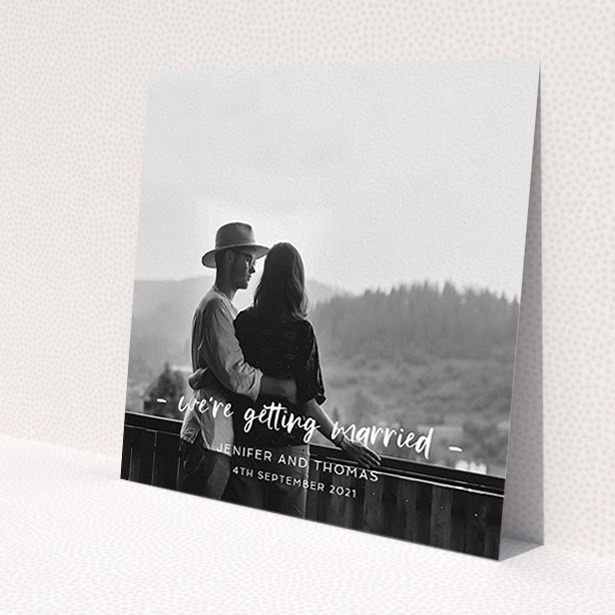 A personalised wedding invitation named 'To the Point'. It is a square (148mm x 148mm) invite in a square orientation. It is a photographic personalised wedding invitation with room for 1 photo. 'To the Point' is available as a flat invite, with mainly white colouring.