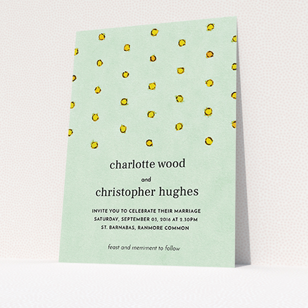 A personalised wedding invitation called "Turquoise polkadots". It is an A6 invite in a portrait orientation. "Turquoise polkadots" is available as a flat invite, with tones of green and yellow.