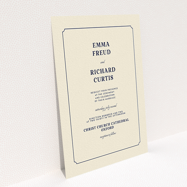 A personalised wedding invite design named "Harrison notch". It is an A6 invite in a portrait orientation. "Harrison notch" is available as a flat invite, with tones of cream and navy blue.