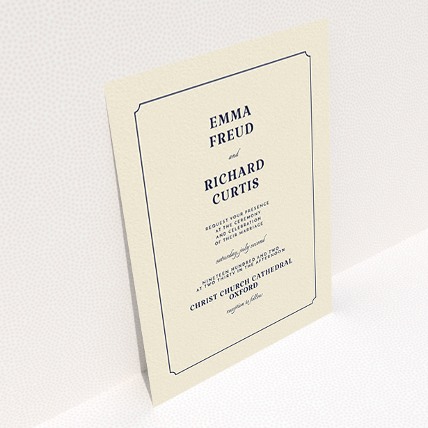 A personalised wedding invite design named "Harrison notch". It is an A6 invite in a portrait orientation. "Harrison notch" is available as a flat invite, with tones of cream and navy blue.