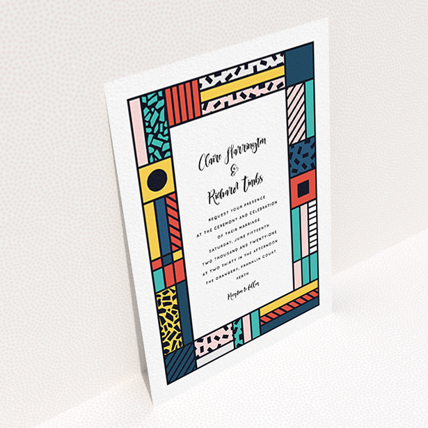 A personalised wedding invite design called "Mondrian-esque". It is an A6 invite in a portrait orientation. "Mondrian-esque" is available as a flat invite, with tones of white and pink.