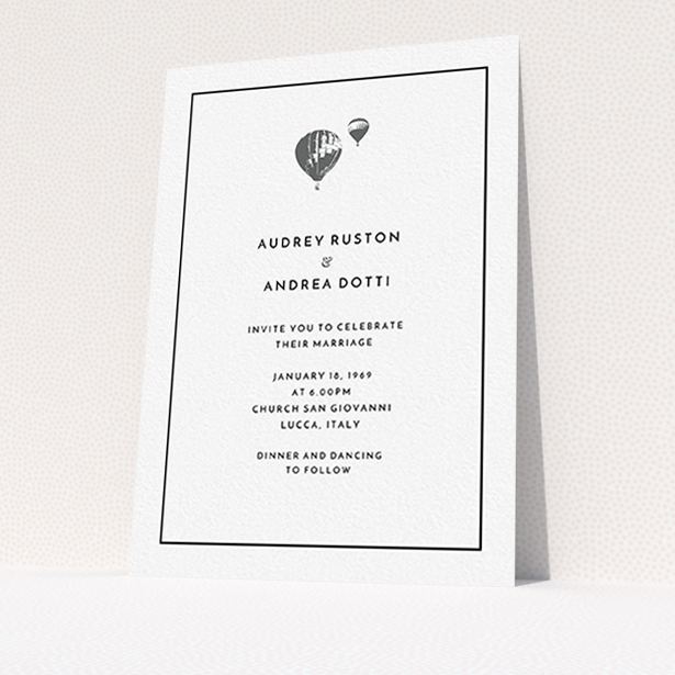 A personalised wedding invite design called "Off and away". It is an A6 invite in a portrait orientation. "Off and away" is available as a flat invite, with tones of white and grey.