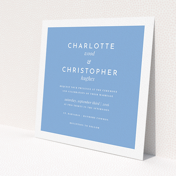 A personalised wedding invite named 'Script switch'. It is a square (148mm x 148mm) invite in a square orientation. 'Script switch' is available as a flat invite, with tones of blue and white.