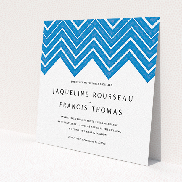 A personalised wedding invite design titled 'Skiapthos'. It is a square (148mm x 148mm) invite in a square orientation. 'Skiapthos' is available as a flat invite, with tones of blue and white.