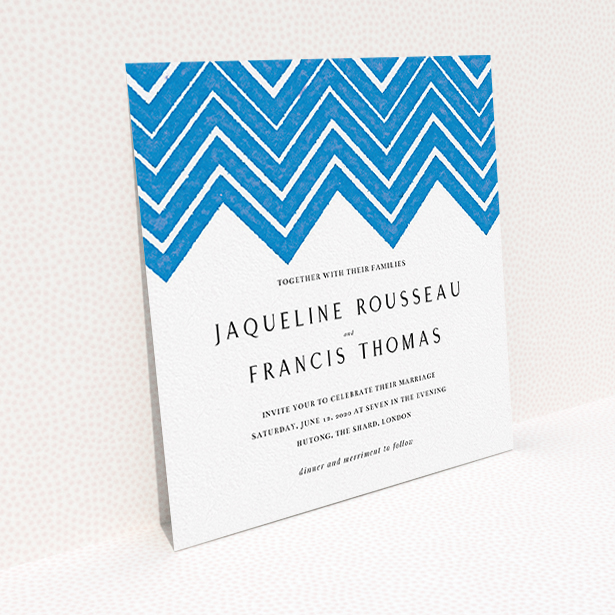 A personalised wedding invite design titled "Skiapthos". It is a square (148mm x 148mm) invite in a square orientation. "Skiapthos" is available as a flat invite, with tones of blue and white.