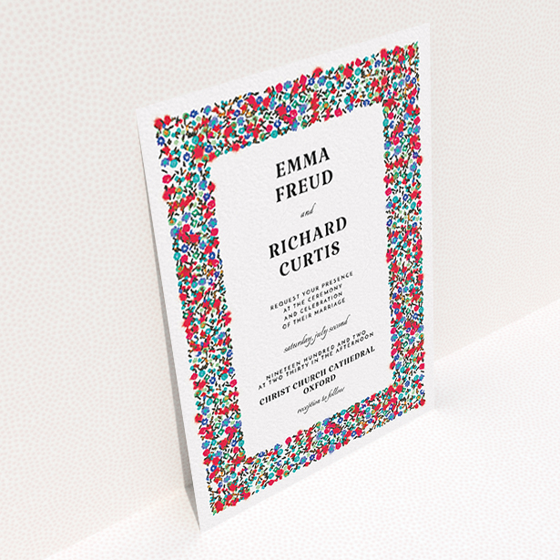 A personalised wedding invite design titled "Summer from a distance". It is an A6 invite in a portrait orientation. "Summer from a distance" is available as a flat invite, with tones of white and red.