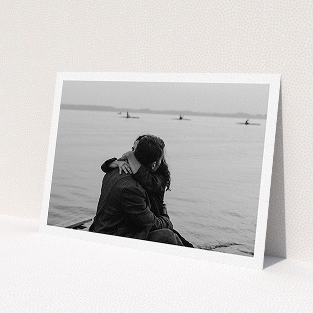 A personalised wedding invite design called 'Thick White Framed Photo'. It is an A6 invite in a landscape orientation. It is a photographic personalised wedding invite with room for 1 photo. 'Thick White Framed Photo' is available as a flat invite.