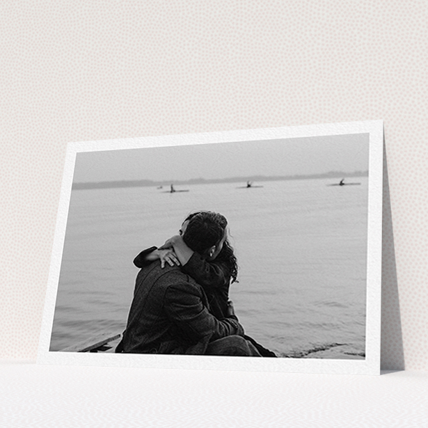 A personalised wedding invite design called "Thick White Framed Photo". It is an A6 invite in a landscape orientation. It is a photographic personalised wedding invite with room for 1 photo. "Thick White Framed Photo" is available as a flat invite.