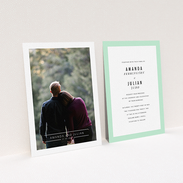 A personalised wedding invite named "Tramlines". It is an A6 invite in a portrait orientation. It is a photographic personalised wedding invite with room for 1 photo. "Tramlines" is available as a flat invite, with mainly white colouring.
