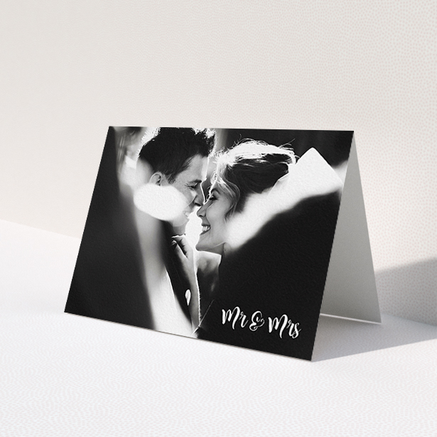 A photo wedding thank you card template titled 'Black and White'. It is an A6 card in a landscape orientation. It is a photographic photo wedding thank you card with room for 1 photo. 'Black and White' is available as a folded card, with mainly white colouring.