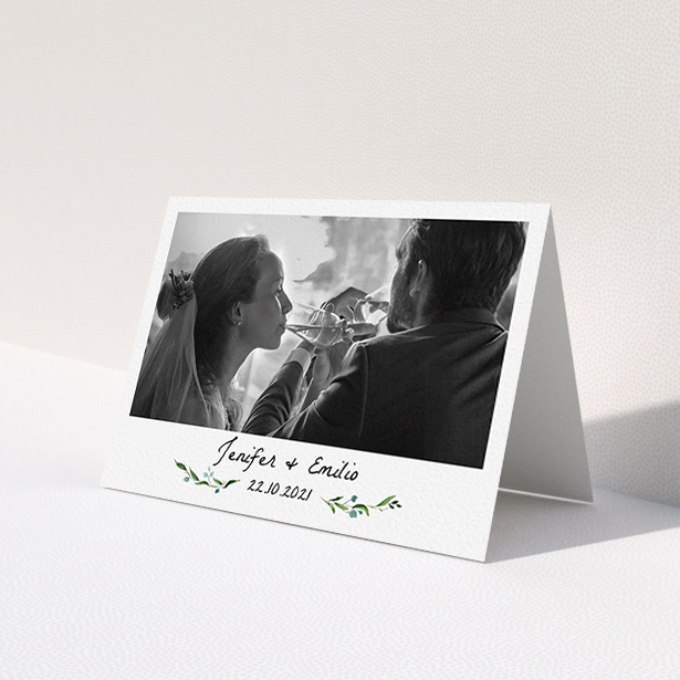 A photo wedding thank you card called 'Classic Floral'. It is an A6 card in a landscape orientation. It is a photographic photo wedding thank you card with room for 1 photo. 'Classic Floral' is available as a folded card, with tones of green and white.