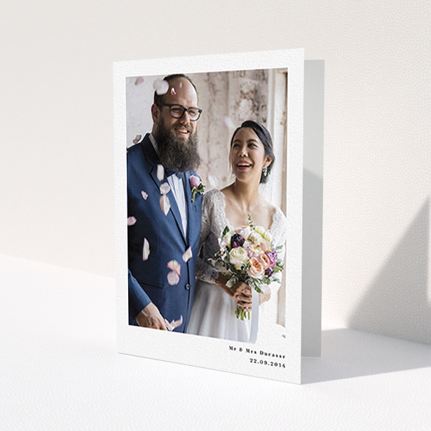 A photo wedding thank you card template titled 'Most of the page'. It is an A6 card in a portrait orientation. It is a photographic photo wedding thank you card with room for 1 photo. 'Most of the page' is available as a folded card, with mainly white colouring.