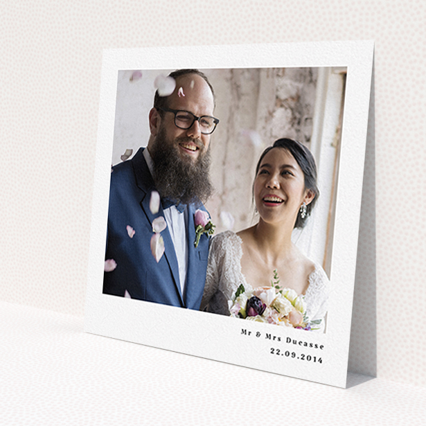 A photo wedding thank you card called 'Most of the page'. It is a square (148mm x 148mm) card in a square orientation. It is a photographic photo wedding thank you card with room for 1 photo. 'Most of the page' is available as a flat card, with mainly white colouring.
