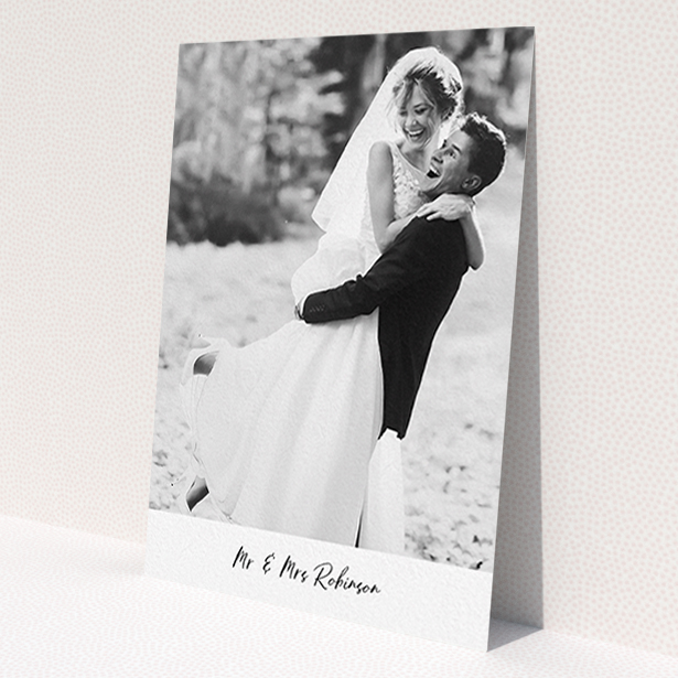 A photo wedding thank you card design named 'Mr & Mrs Footer'. It is an A6 card in a portrait orientation. It is a photographic photo wedding thank you card with room for 1 photo. 'Mr & Mrs Footer' is available as a flat card, with mainly white colouring.