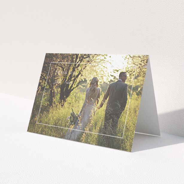 A photo wedding thank you card template titled 'Not even there'. It is an A6 card in a landscape orientation. It is a photographic photo wedding thank you card with room for 1 photo. 'Not even there' is available as a folded card, with mainly white colouring.
