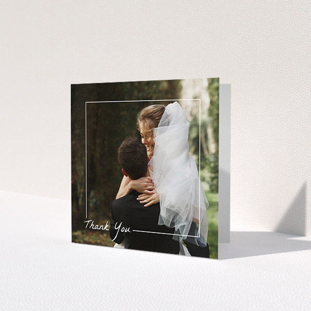 A photo wedding thank you card template titled 'On Photo Border'. It is a square (148mm x 148mm) card in a square orientation. It is a photographic photo wedding thank you card with room for 1 photo. 'On Photo Border' is available as a folded card, with mainly white colouring.