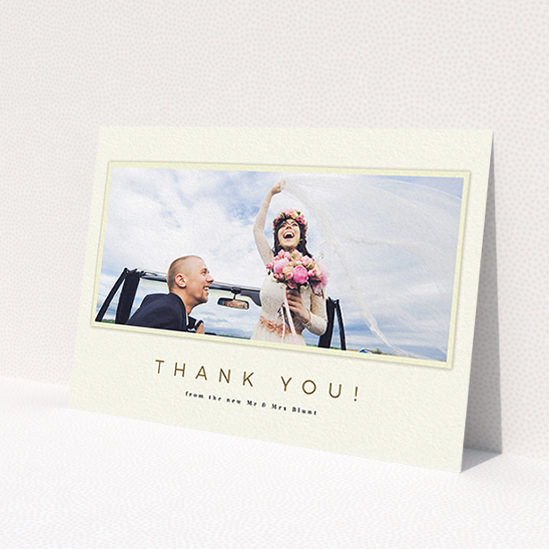 A photo wedding thank you card design named 'One white Polaroid '. It is an A6 card in a landscape orientation. It is a photographic photo wedding thank you card with room for 1 photo. 'One white Polaroid ' is available as a flat card, with mainly cream colouring.