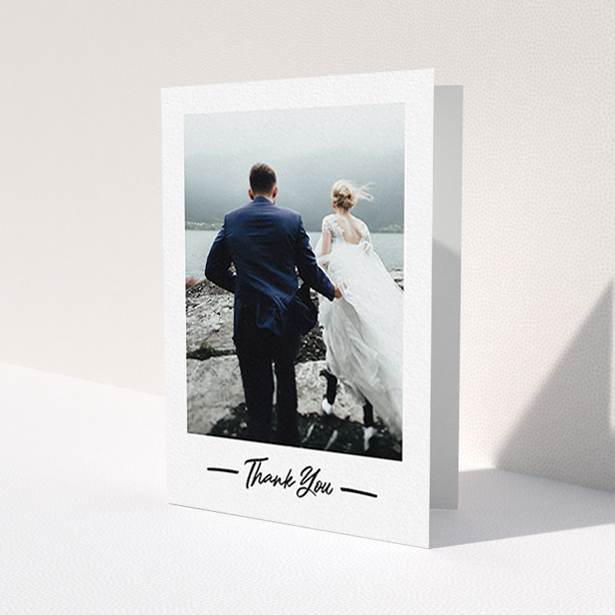 A photo wedding thank you card named 'Portrait Thank You Photo'. It is an A6 card in a portrait orientation. It is a photographic photo wedding thank you card with room for 1 photo. 'Portrait Thank You Photo' is available as a folded card, with mainly white colouring.