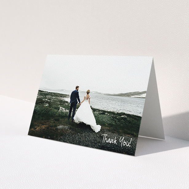 A photo wedding thank you card called 'Rough but Simple Photo'. It is an A6 card in a landscape orientation. It is a photographic photo wedding thank you card with room for 1 photo. 'Rough but Simple Photo' is available as a folded card, with mainly white colouring.