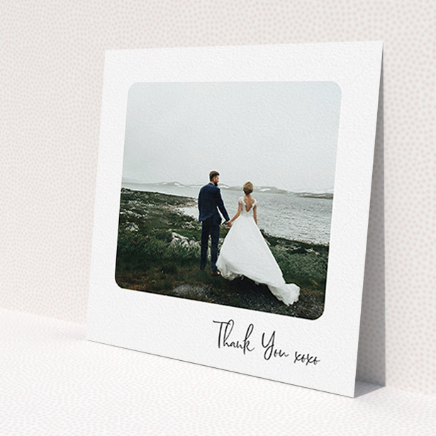 A photo wedding thank you card design called 'Rounded Thanks'. It is a square (148mm x 148mm) card in a square orientation. It is a photographic photo wedding thank you card with room for 1 photo. 'Rounded Thanks' is available as a flat card, with mainly white colouring.