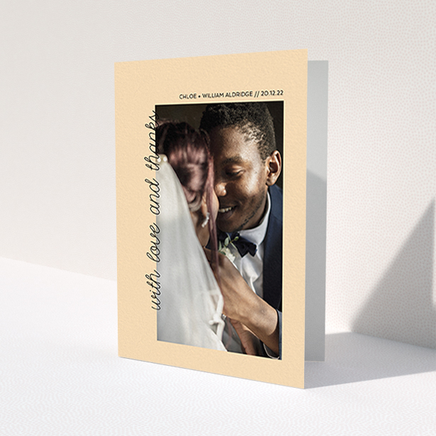 A photo wedding thank you card design called 'Rustic Orange Photo Frame'. It is an A6 card in a portrait orientation. It is a photographic photo wedding thank you card with room for 1 photo. 'Rustic Orange Photo Frame' is available as a folded card, with mainly faded orange colouring.