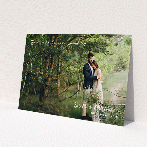 A photo wedding thank you card named 'Scripted'. It is an A6 card in a landscape orientation. It is a photographic photo wedding thank you card with room for 1 photo. 'Scripted' is available as a flat card, with mainly white colouring.