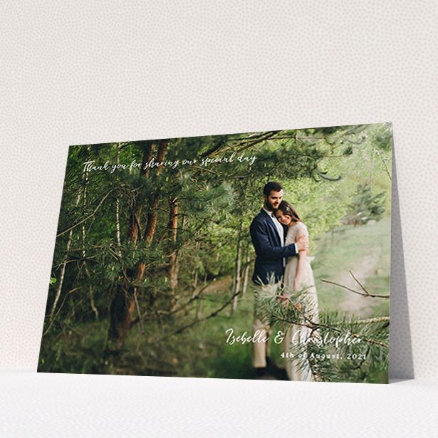 A photo wedding thank you card named "Scripted". It is an A6 card in a landscape orientation. It is a photographic photo wedding thank you card with room for 1 photo. "Scripted" is available as a flat card, with mainly white colouring.