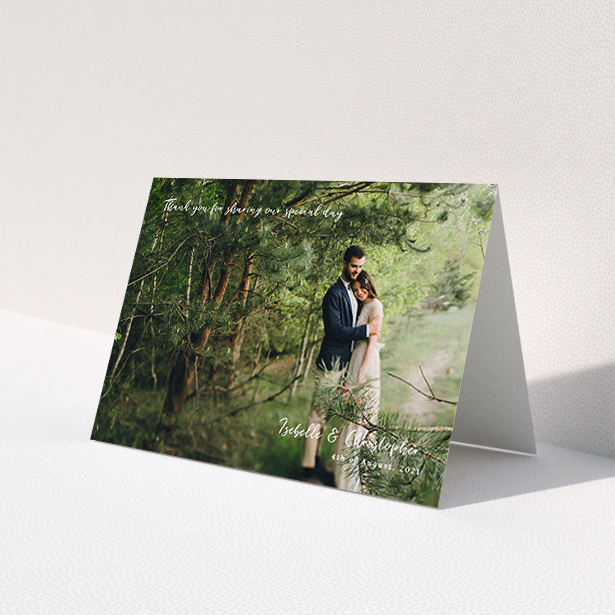 A photo wedding thank you card design called 'Scripted'. It is an A6 card in a landscape orientation. It is a photographic photo wedding thank you card with room for 1 photo. 'Scripted' is available as a folded card, with mainly white colouring.