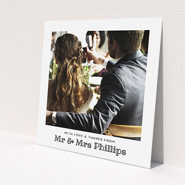 A photo wedding thank you card design titled 'Simple Photo Frame'. It is a square (148mm x 148mm) card in a square orientation. It is a photographic photo wedding thank you card with room for 1 photo. 'Simple Photo Frame' is available as a flat card, with mainly white colouring.