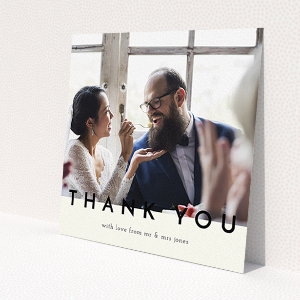 A photo wedding thank you card design titled 'Split thank you '. It is a square (148mm x 148mm) card in a square orientation. It is a photographic photo wedding thank you card with room for 1 photo. 'Split thank you ' is available as a flat card, with mainly cream colouring.