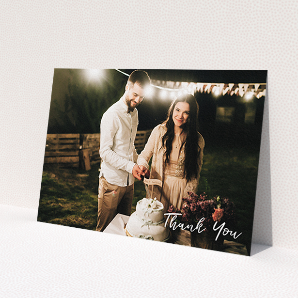 A photo wedding thank you card design named 'Thanks From The Corner'. It is an A6 card in a landscape orientation. It is a photographic photo wedding thank you card with room for 1 photo. 'Thanks From The Corner' is available as a flat card, with mainly white colouring.