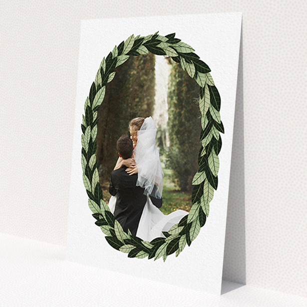 A photo wedding thank you card design titled 'Thick Wreath Frame'. It is an A6 card in a portrait orientation. It is a photographic photo wedding thank you card with room for 1 photo. 'Thick Wreath Frame' is available as a flat card, with tones of light green and dark green.