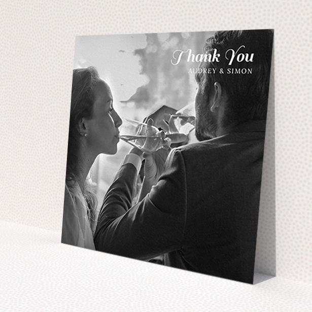 A photo wedding thank you card design called 'Top-Right'. It is a square (148mm x 148mm) card in a square orientation. It is a photographic photo wedding thank you card with room for 1 photo. 'Top-Right' is available as a flat card, with mainly white colouring.